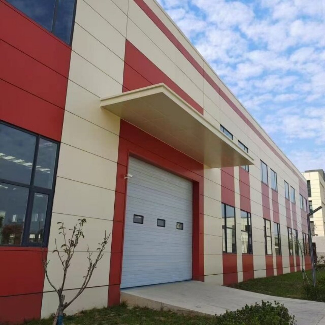 Steel structure warehouse with roller shutter door