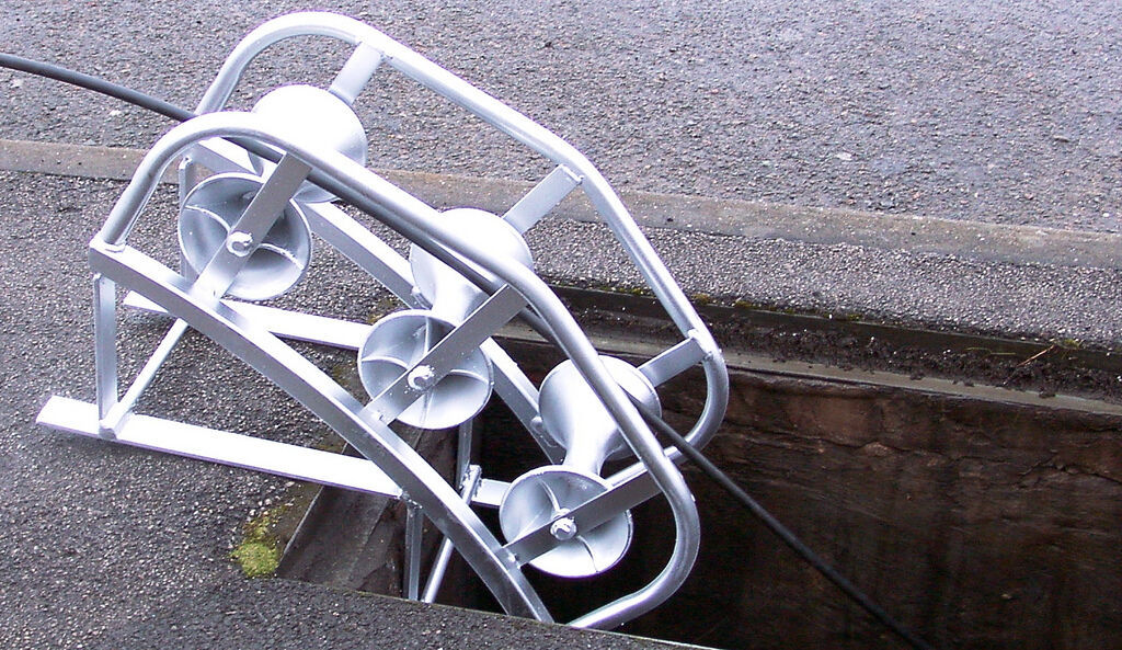 use-manhole-cable-rollers.jpg