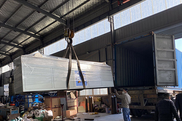 Machine Loading into the Containers for Shipment