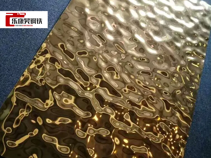 Embossed corrugated stainless steel decorative plate