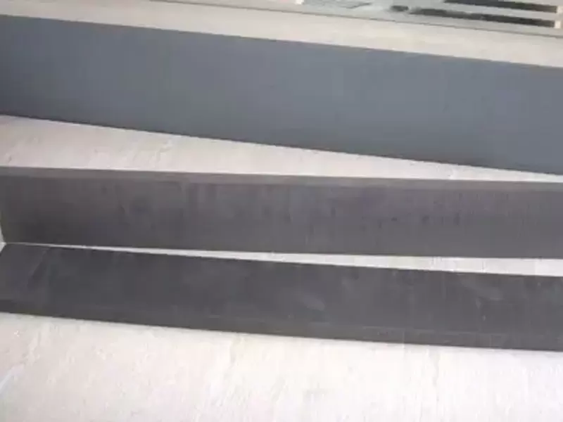 Graphite baffle for degasser