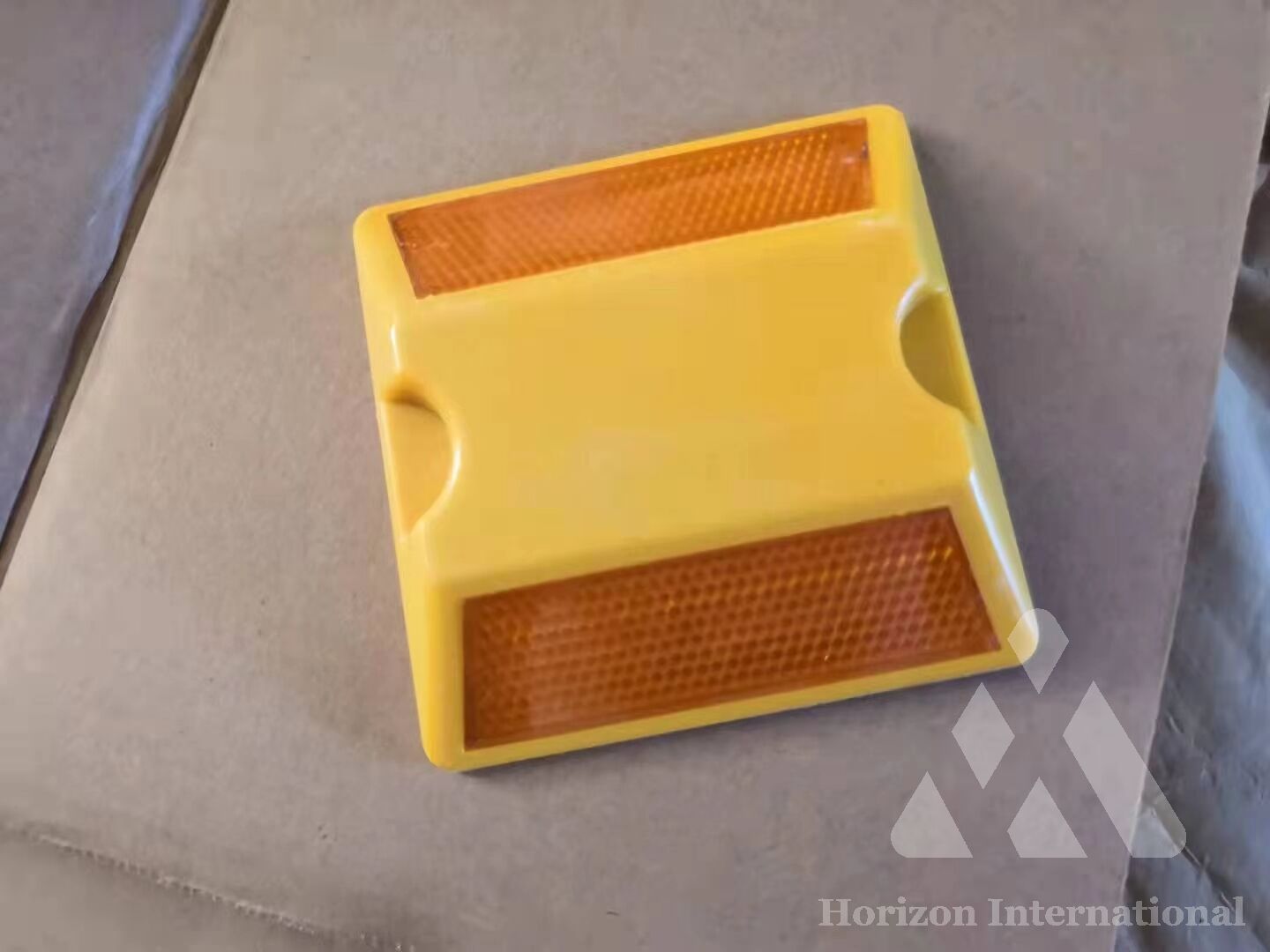 Plastic reflective road stud