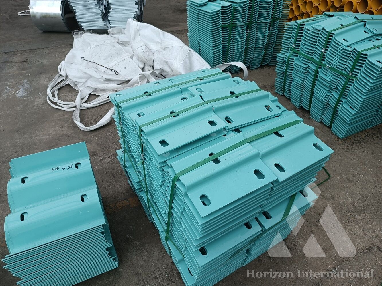 Plastic coated thrie beam spacers