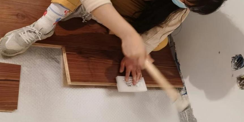 Filipino Sisters Install Laminate Flooring