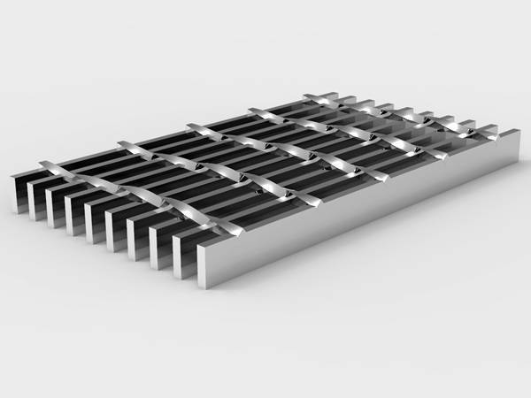 A piece of heavy duty stainless steel grating on gray background..jpg