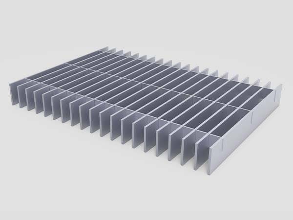 Swaged flush-top aluminum grating with a plain surface is displayed..jpg