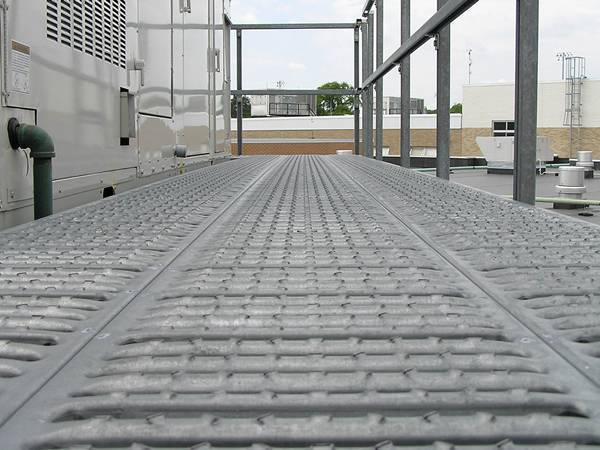 The inspection walkway is made of aluminum swage locked grating..jpg