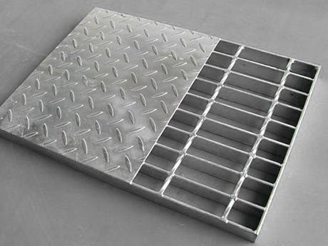 A compound steel grating with half of checkered steel plate on it..jpg