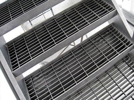 Four stair treads made of plug grating..jpg