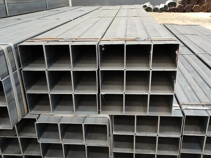 How should carbon steel tubes be stored?