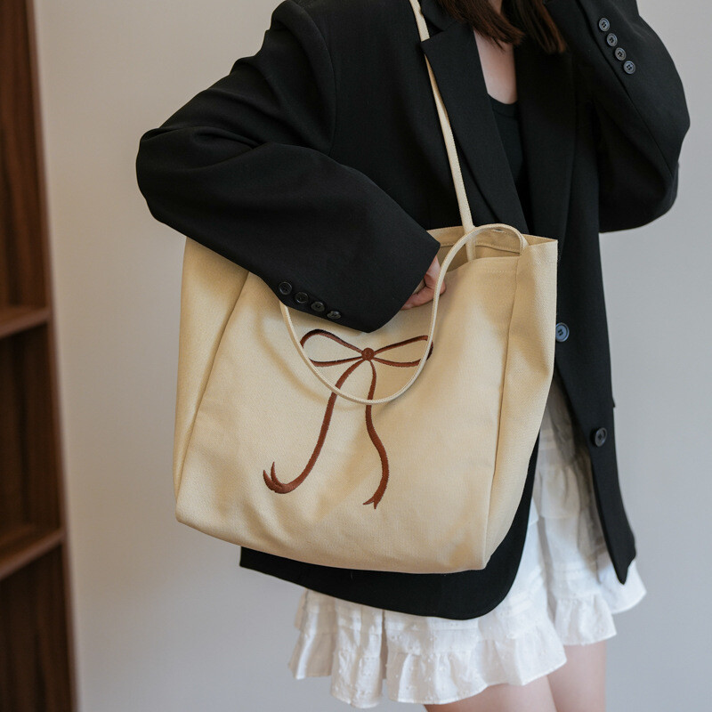 帆布　大容量　ショルダーバッグ　蝶結び　トートバッグ　シンプル　学生鞄　かばん　カバン　ディズニー監査バッグ工場　ライセンスバッグ