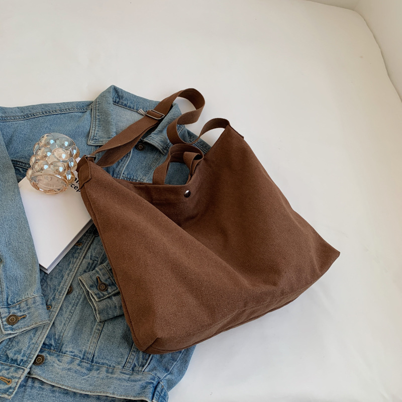 帆布バッグ レディース 2025新作 シンプル カジュアル 大容量 ショルダーバッグ 汎用 通勤 通学 斜めがけバッグ おしゃれ