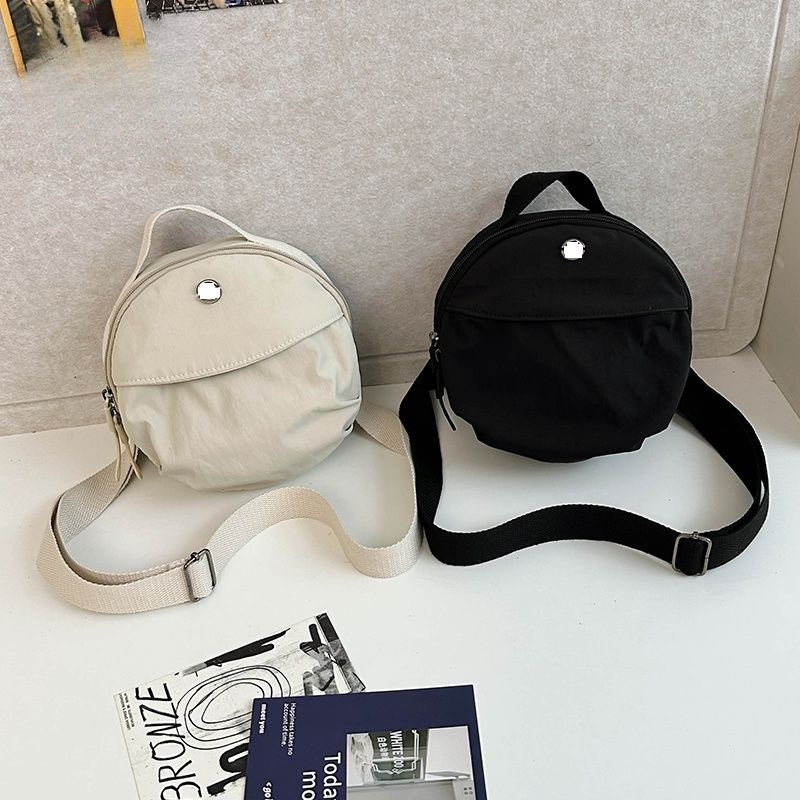 2025年新作  個性的 小型ラウンドバッグ かわいい 汎用 スマホポーチ 通勤 お出掛け ショルダーバッグ