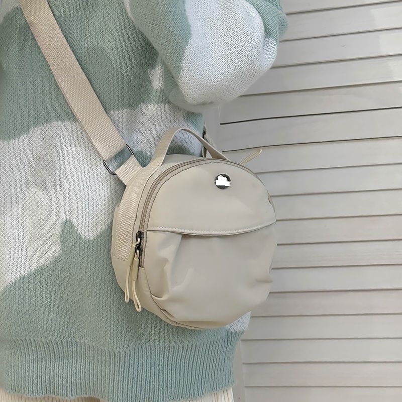 2025年新作  個性的 小型ラウンドバッグ かわいい 汎用 スマホポーチ 通勤 お出掛け ショルダーバッグ