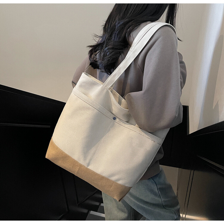 抜け感キャンバスバッグ レディース 大容量 2025新作 マルチスタイル カジュアルショルダーバッグ 大学生通学トートバッグ クロスボーダー対応