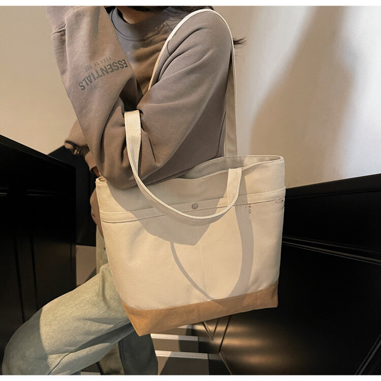 抜け感キャンバスバッグ レディース 大容量 2025新作 マルチスタイル カジュアルショルダーバッグ 大学生通学トートバッグ クロスボーダー対応