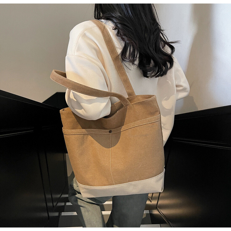 抜け感キャンバスバッグ レディース 大容量 2025新作 マルチスタイル カジュアルショルダーバッグ 大学生通学トートバッグ クロスボーダー対応