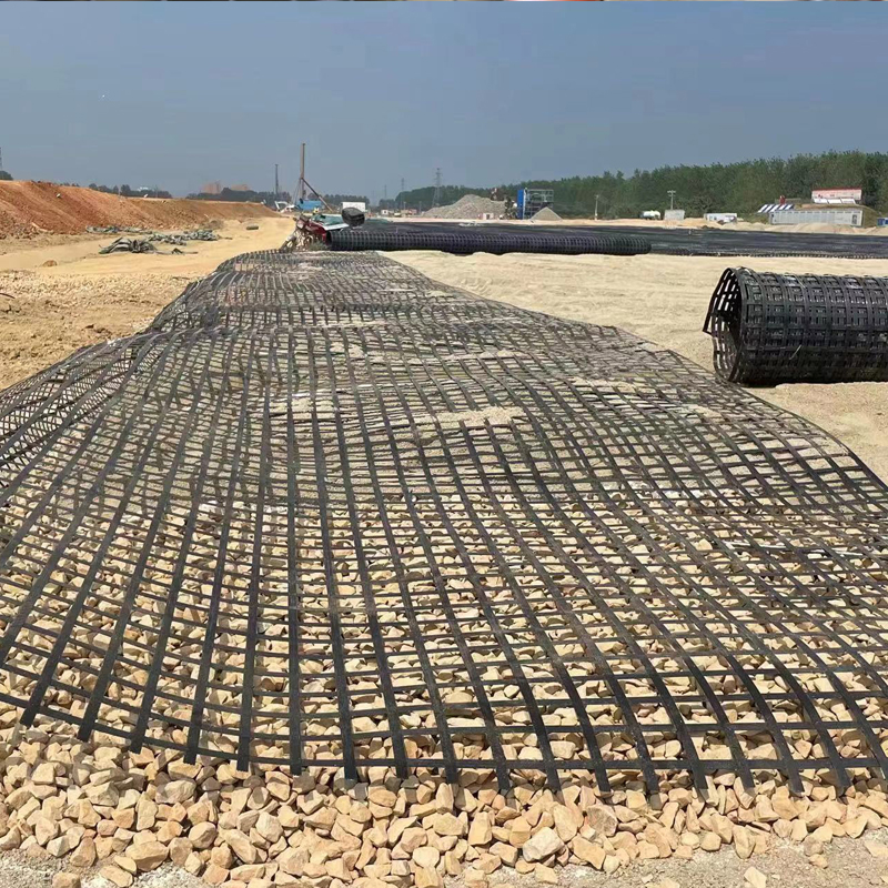 Steel-Plastic Geogrid for Retaining Wall Reinforcement