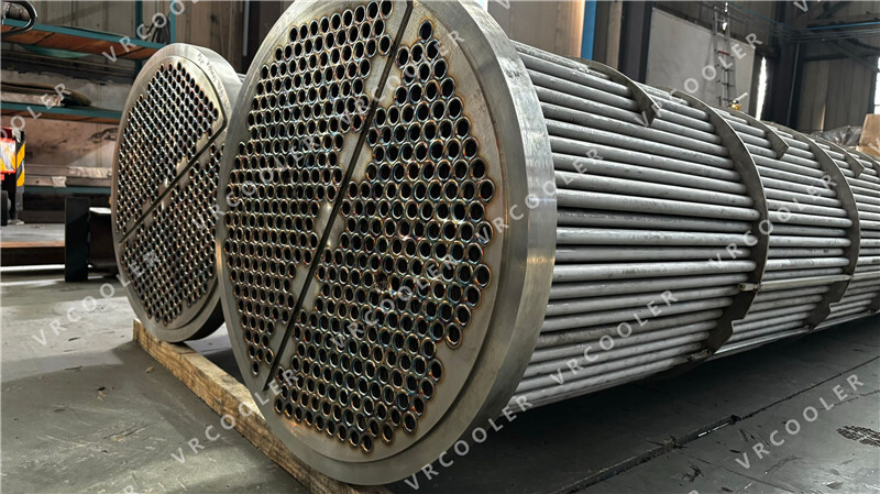 How is the heat transferred in a shell and tube heat exchanger?