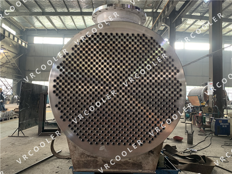 How can you make a shell and tube heat exchanger more efficient?