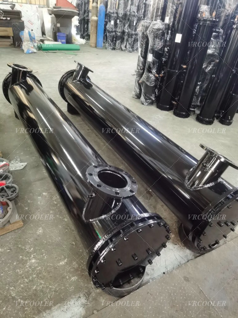 How does a shell-and-tube evaporator work in a central AC system?