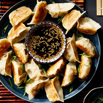 Traditional Steamed Dumplings with Soy Sauce Dip
