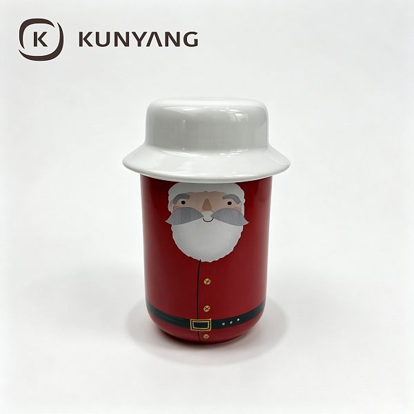 Red Santa Claus ceramic mug with a white cup lid and cap