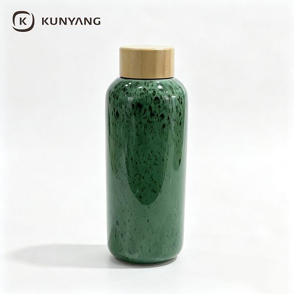 Emerald Green Speckled Ceramic Water Bottle with Bamboo Lid