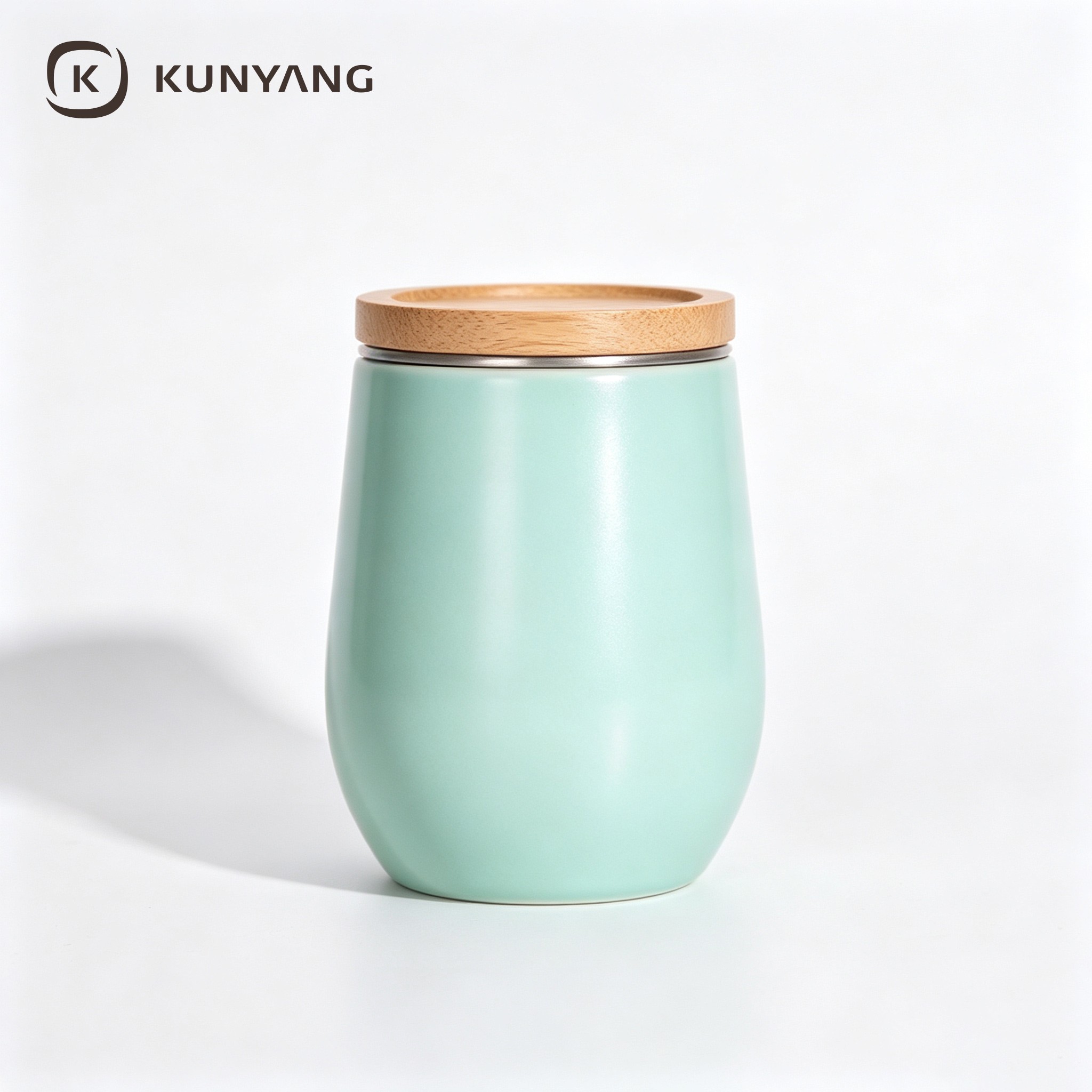 Mint Green Curved Ceramic Canister with Bamboo Lid