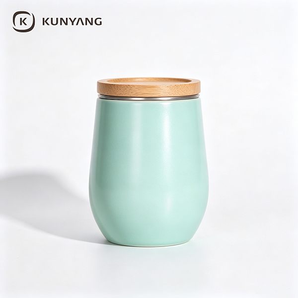 Mint Green Curved Ceramic Canister with Bamboo Lid