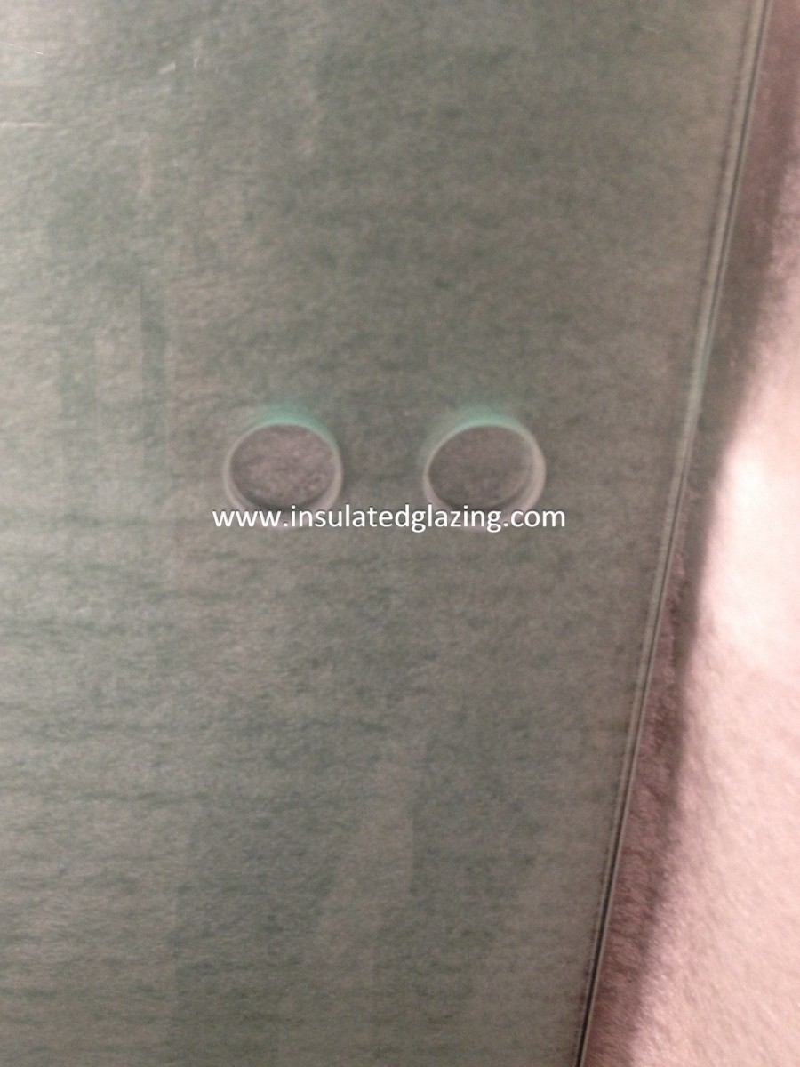 10mm tempered glass with holes 1.jpg 10mm tempered glass with holes 1.jpg