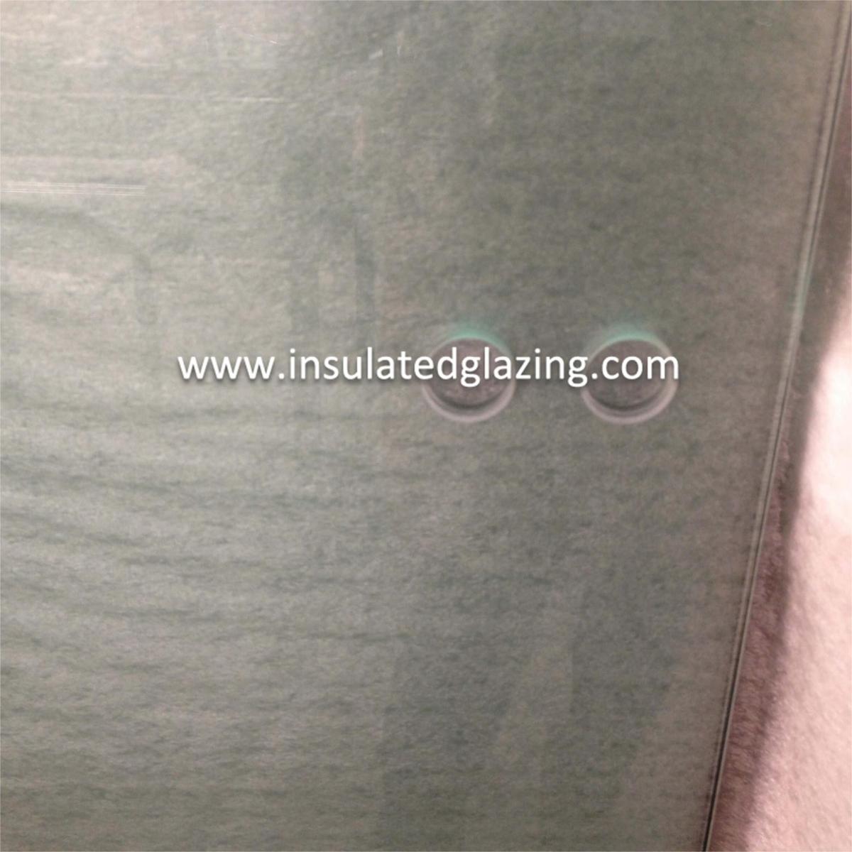 glass shower door with holes.jpg
