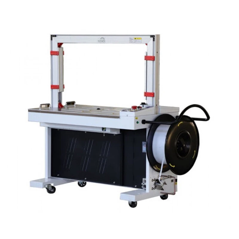 Automatic carton strapping machine
