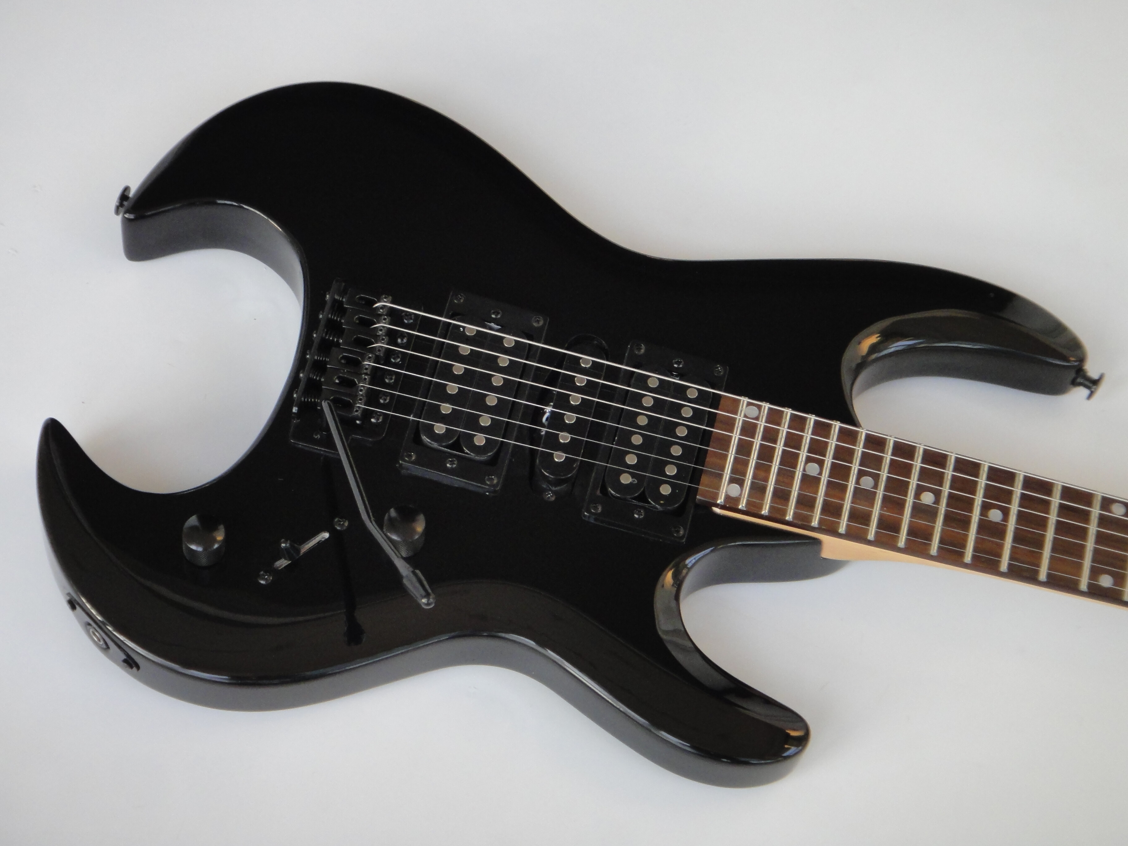 Afanti Customized Hsh Vintage Synchronized Tremolo 6 String Headless Electric Guitar