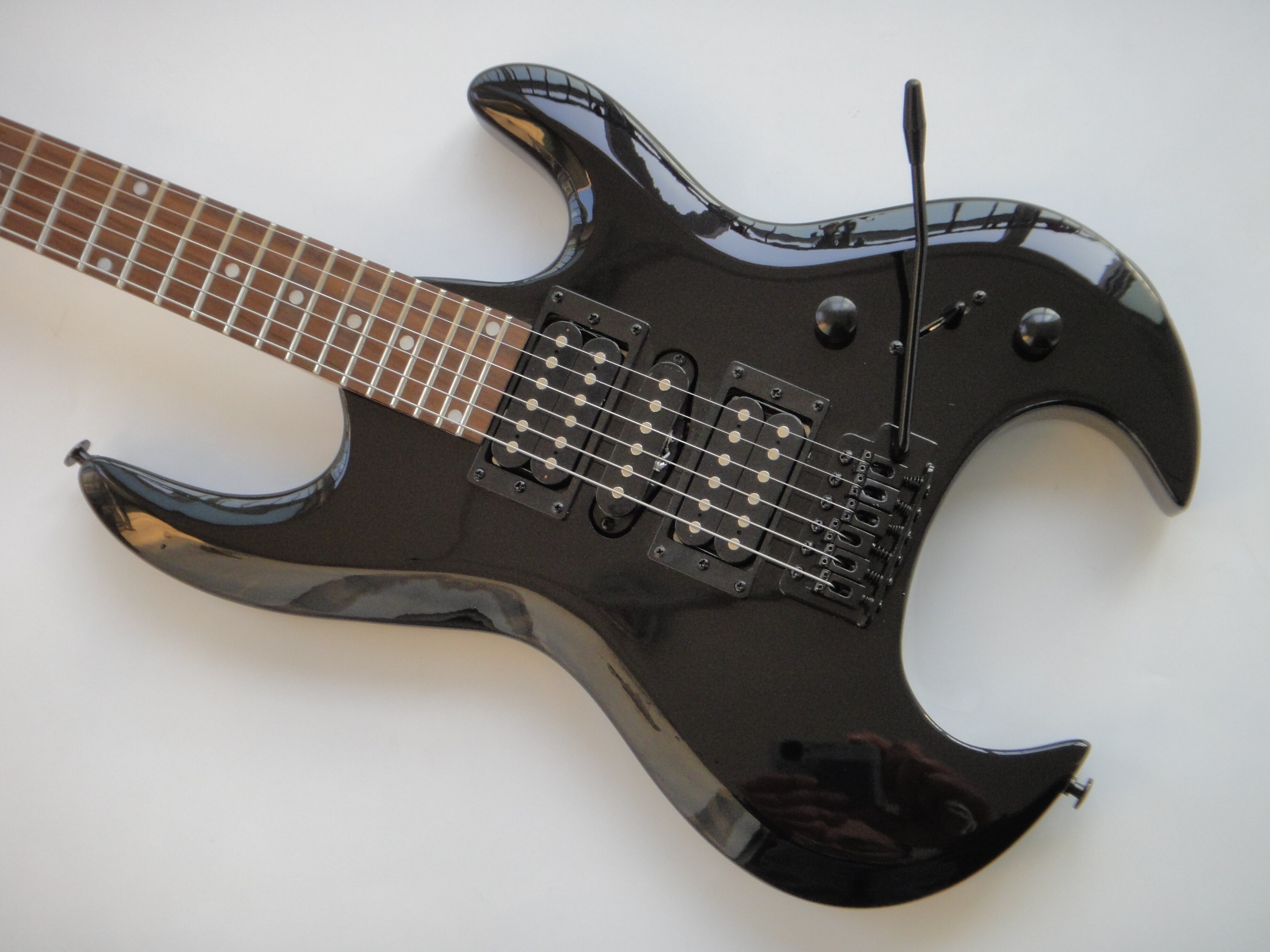 Afanti Customized Hsh Vintage Synchronized Tremolo 6 String Headless Electric Guitar