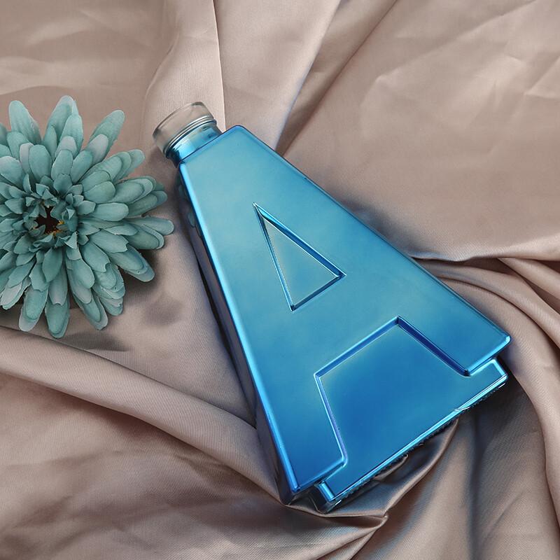 Blue spray letter A whiskey bottle