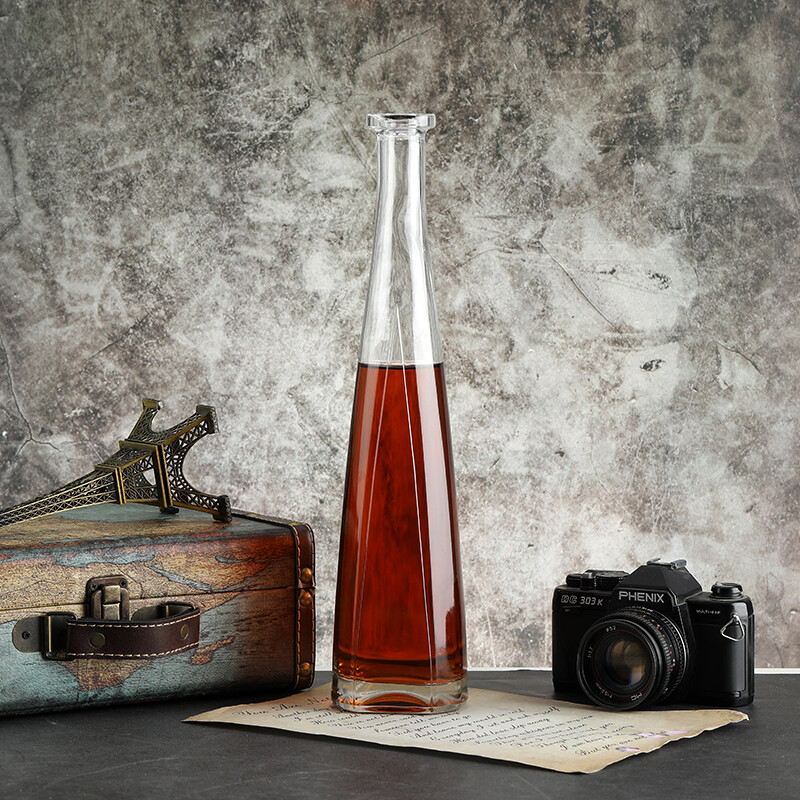 Small mouth long neck whiskey bottle