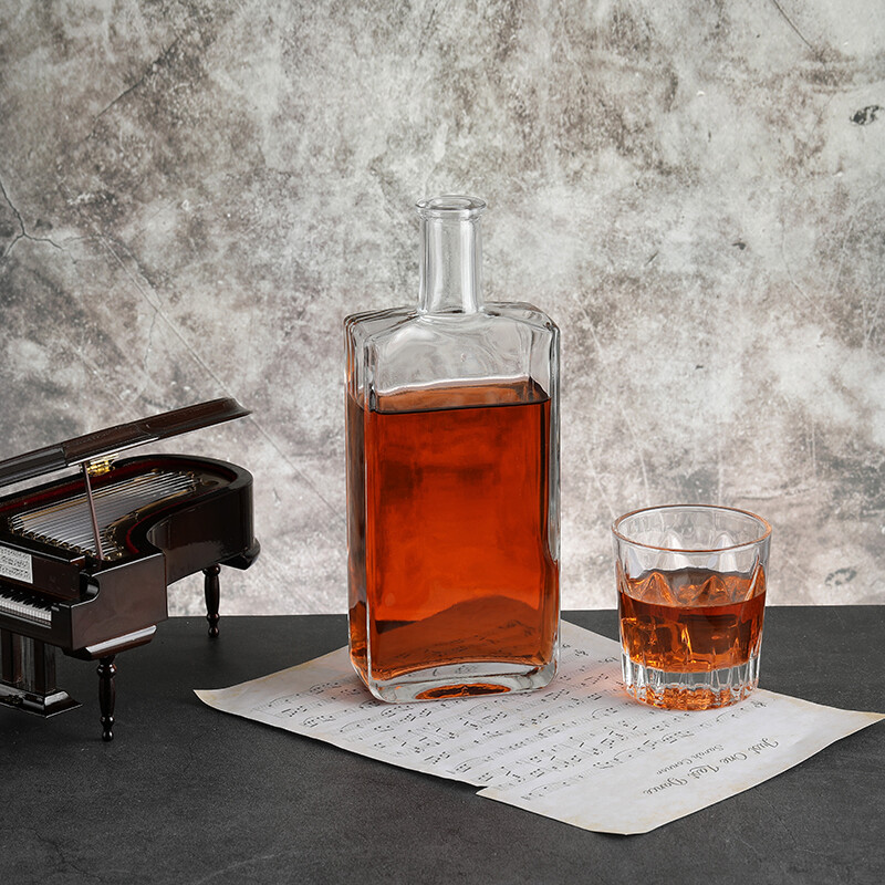 Tall rectangular glass bottle