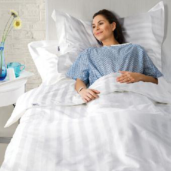 Why are hotel bed sheets all white?