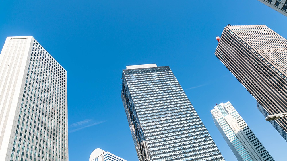 high-rise-buildings-blue-sky-shinjuku-tokyo.png