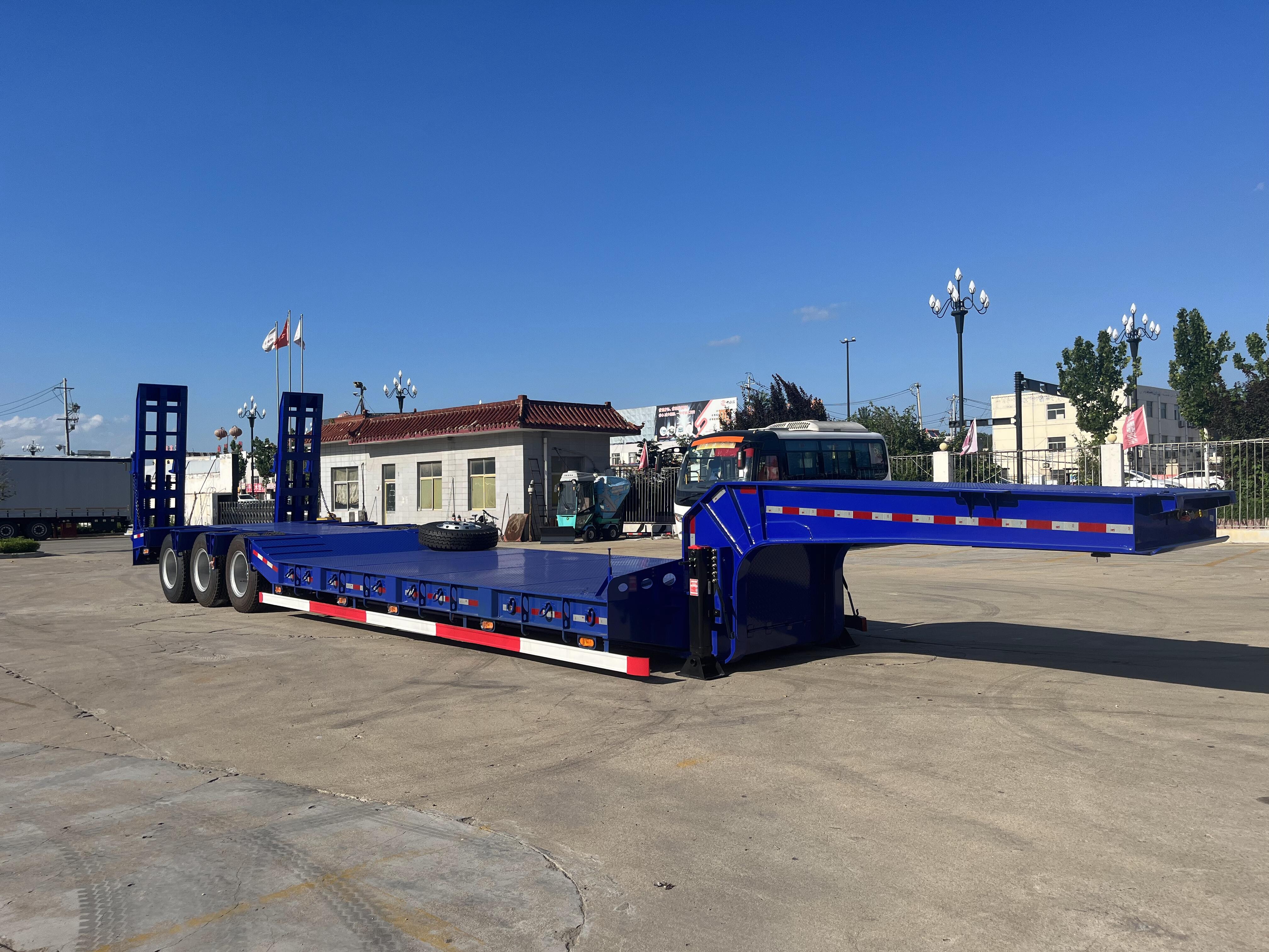Low bed semi trailer with ladder