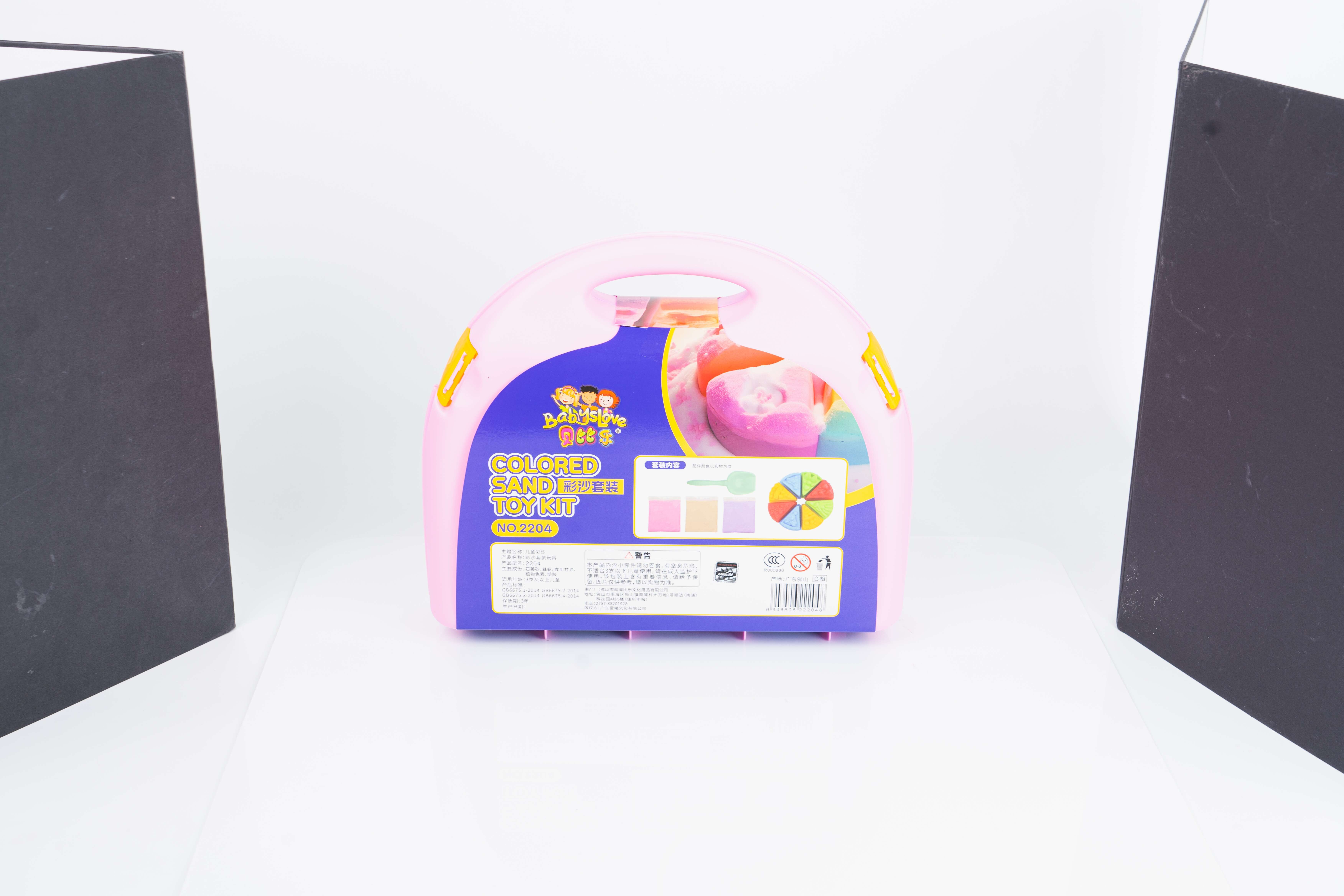 Suitcase colored sand