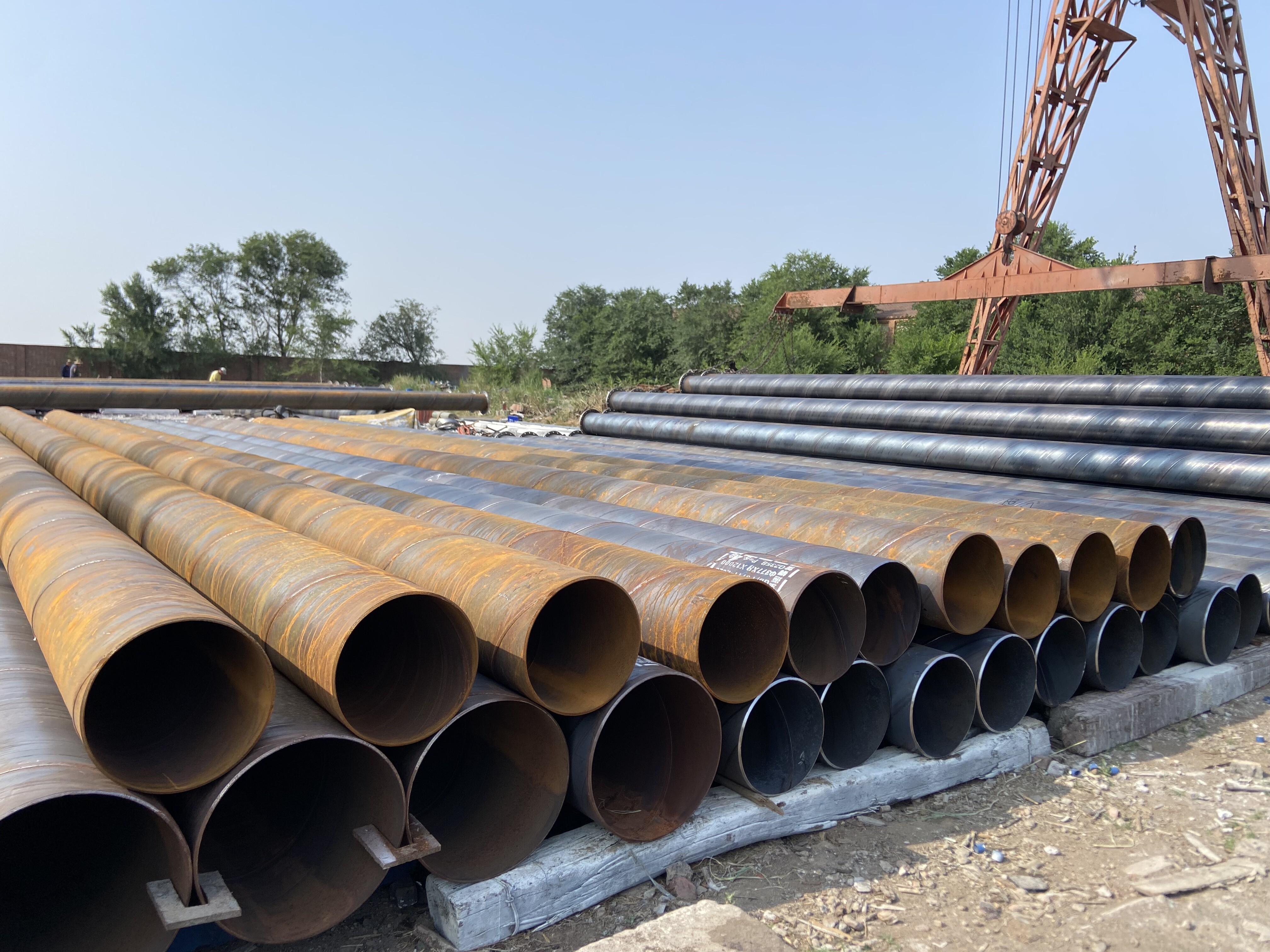 Production process of straight seam welded steel pipe