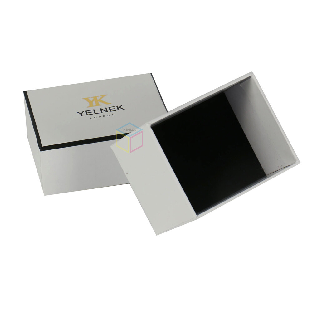 Custom Silver Foil Logo Matt Black Magnets Closure Rigid Cardboard Cosmetic Lipstick Packaging with Crinkle Shreded Paper Insert | OEM Luxury Gift Box Manufacturer