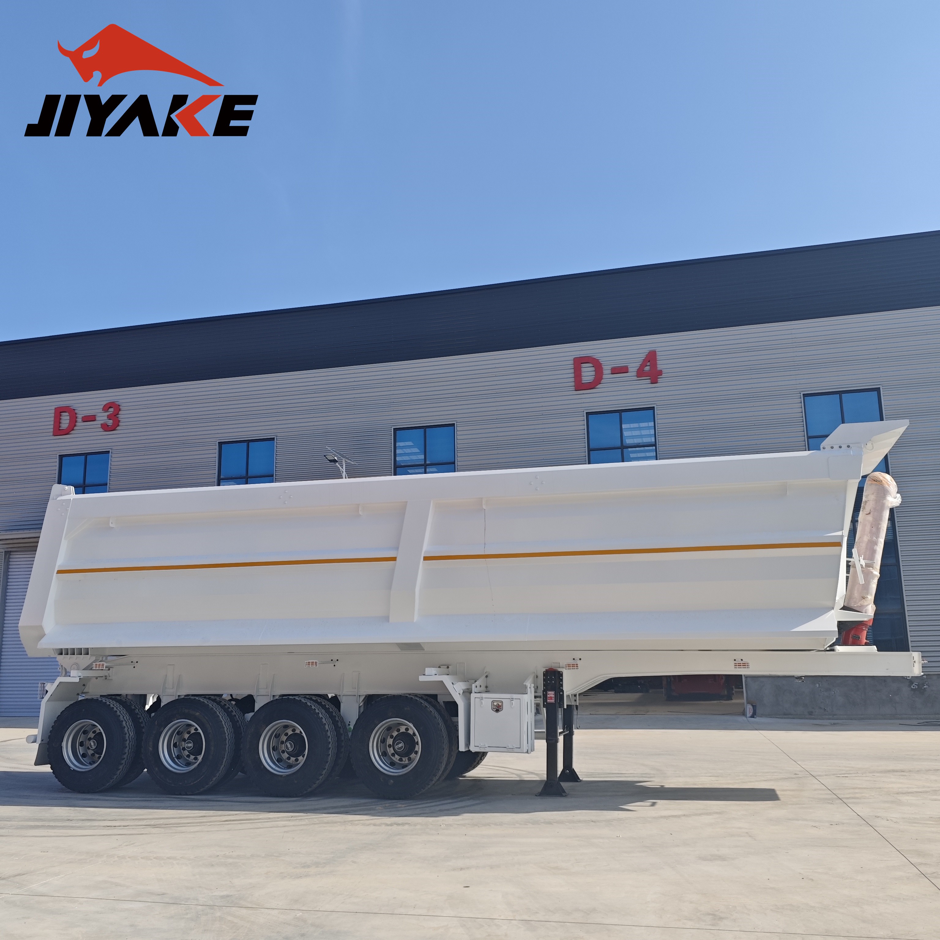 Four axle dump semi-trailer
