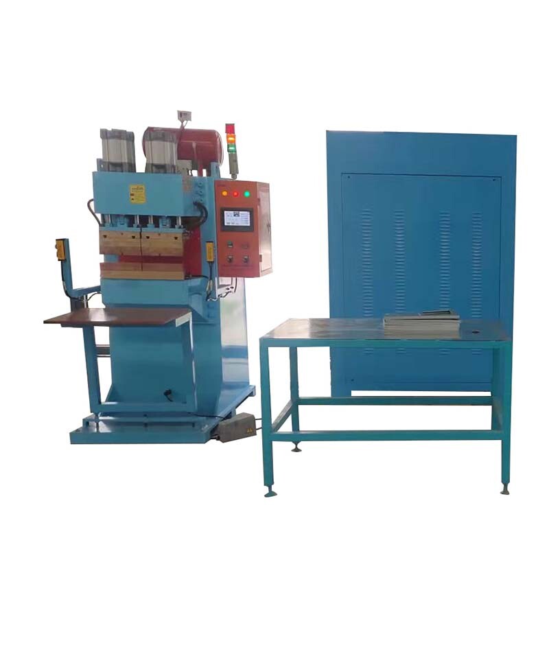 Double-head energy storage row welding machine