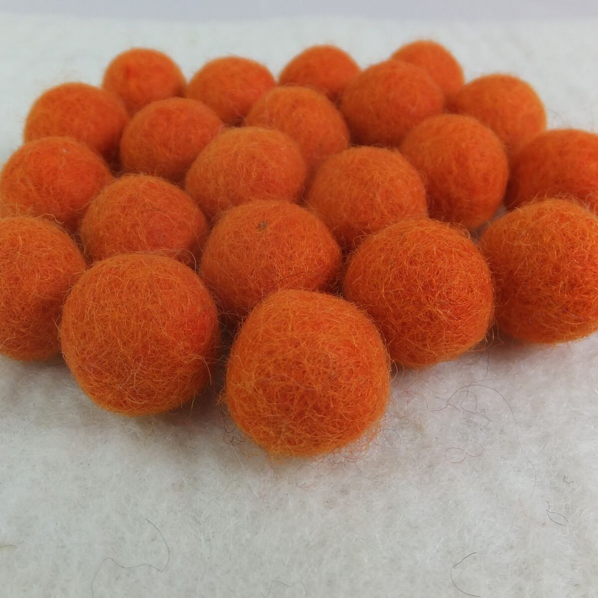 Ordinary felt ball orange