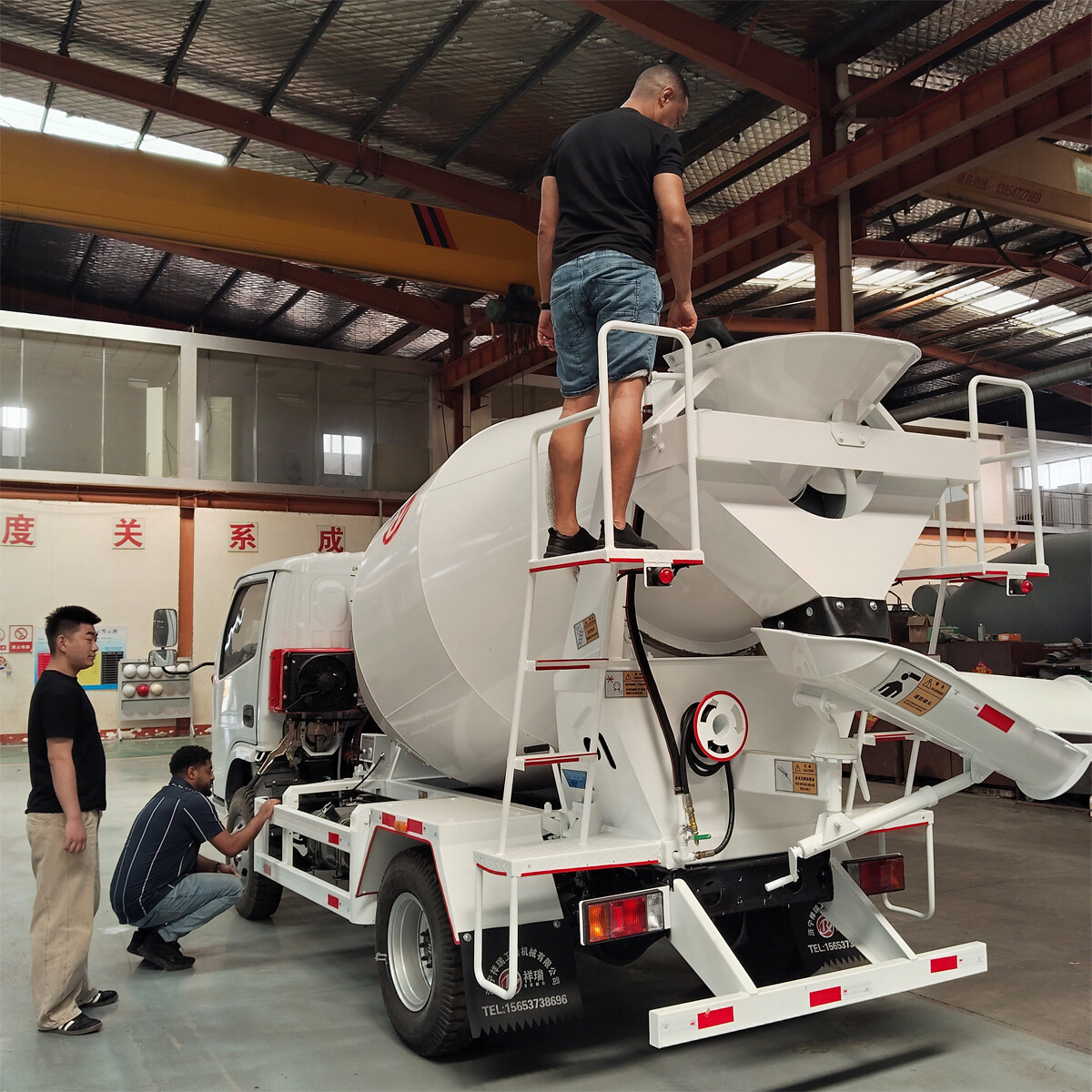 Ethiopian customers inspect concrete mixer trucks Ethiopian customers inspect concrete mixer trucks