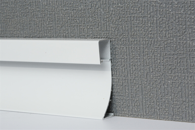 Exposed lamp with baseboard