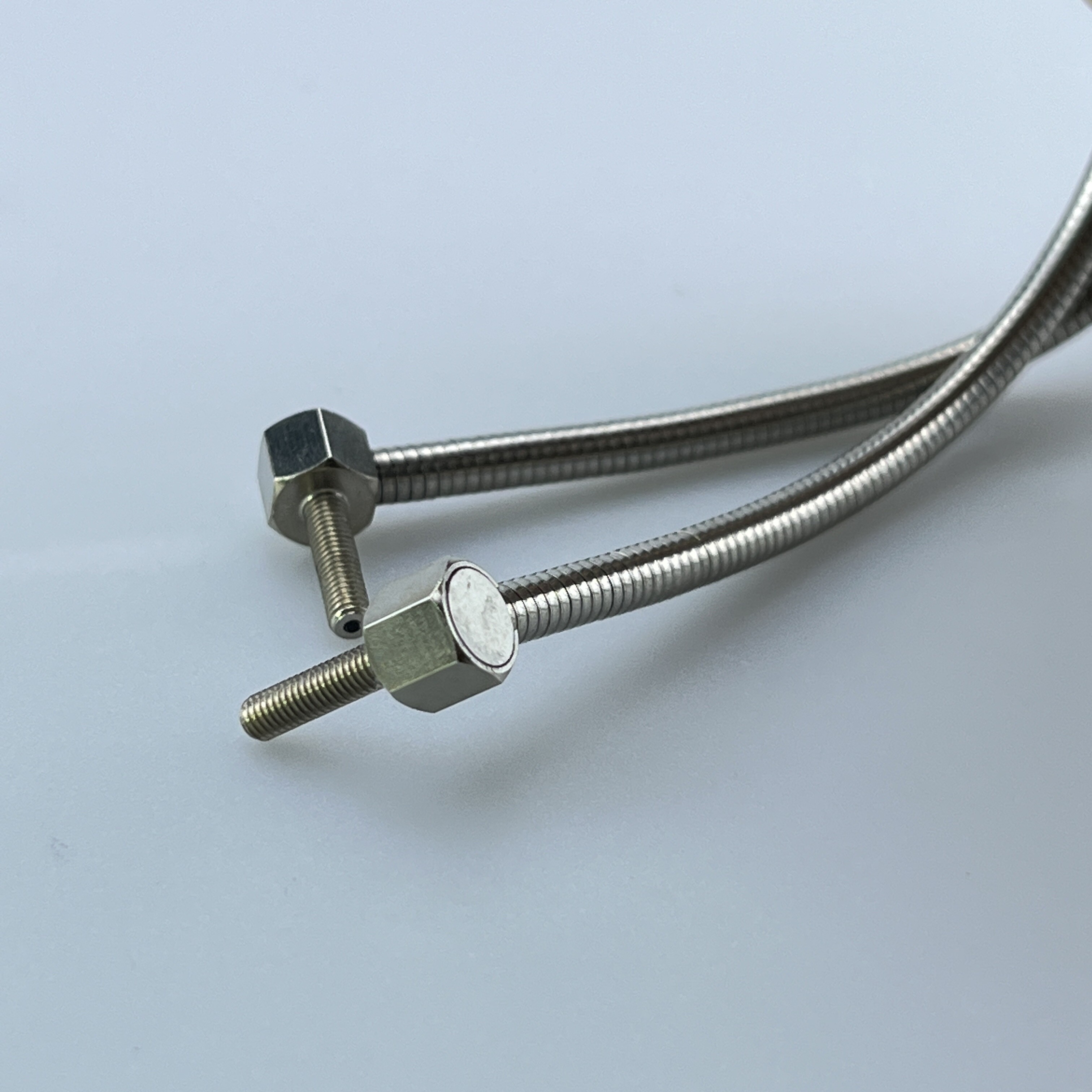 Metal sheathed optical fiber